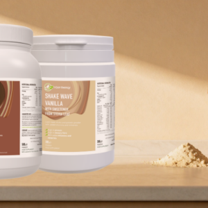 three protein powder bottles on thekitchen desk next to protein shaker